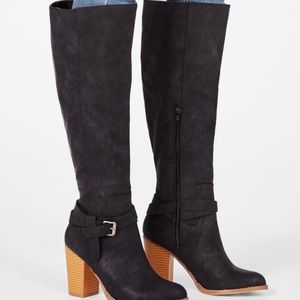 Knee high heeled boots